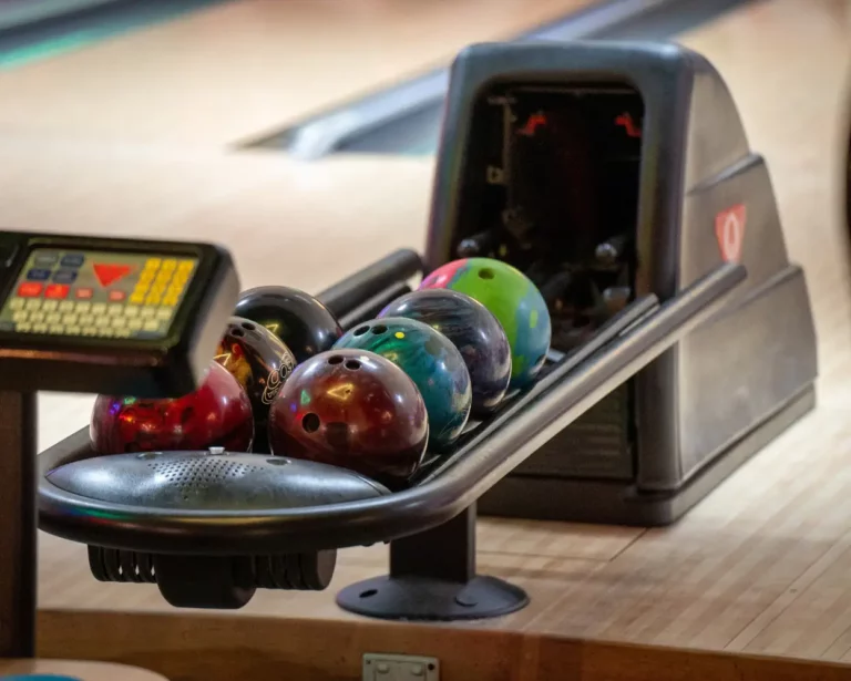 Bowling bowls at NDIS group activity