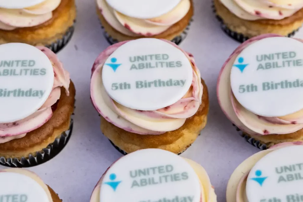 United Abilities branded cupcakes for 5th Anniversary Birthday